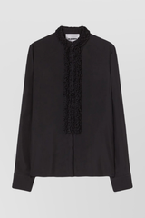 Washed fluid viscose shirt with ruffled colllar and buttonlining