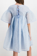 Nimbus matelassé bell shaped dress with voluminous skirt